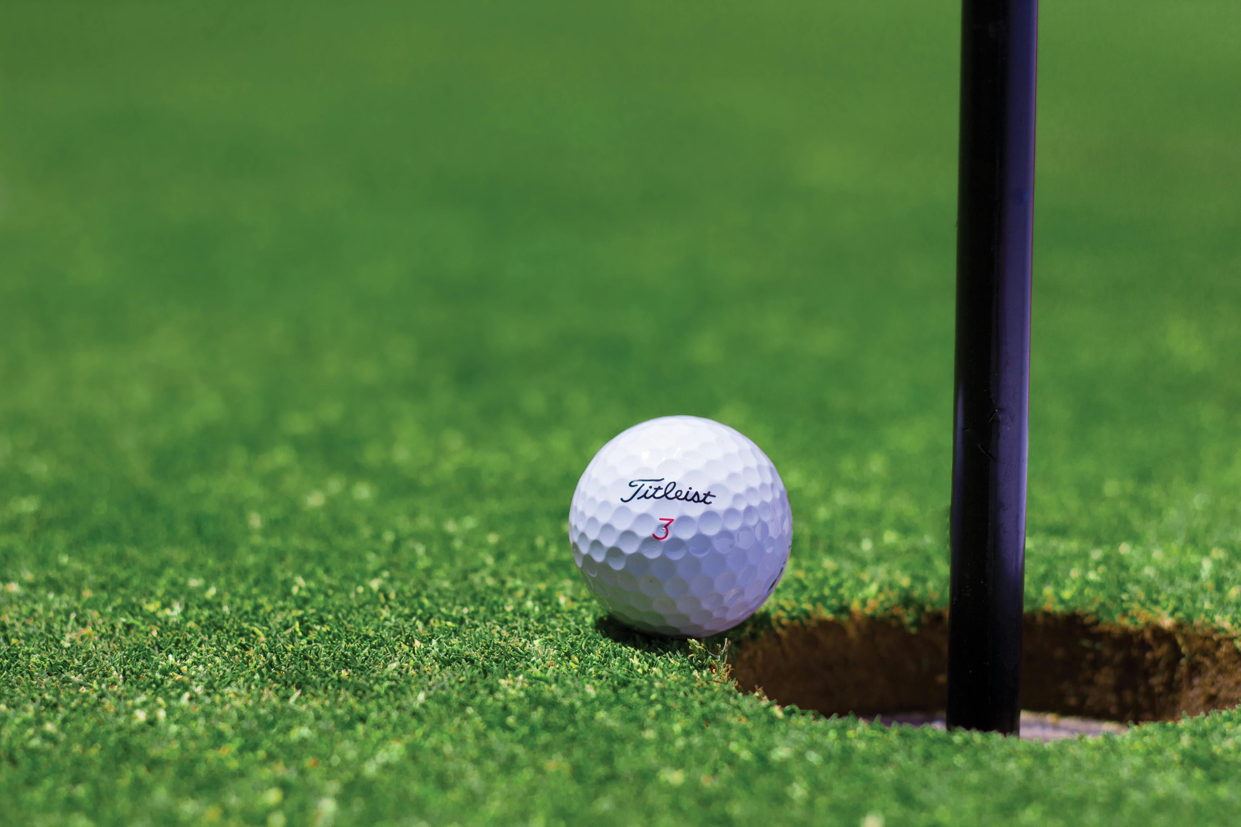 Golf ball near hole